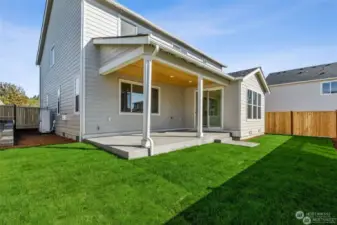 Photo of a similar home in same community.