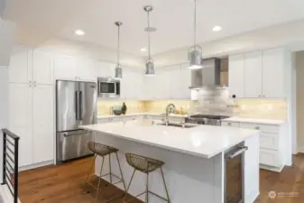 Built-in wine cooler in chef's kitchen.