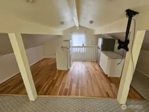 Bonus room above the garage.  Great place for a playroom or several bunk beds.