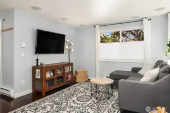 The living room has built in speakers to enchance your tv watching experience.
