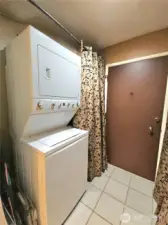 Stackable washer and dryer leave room for storage.