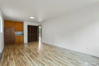 Huge multi-purpose room with sink/cabinets