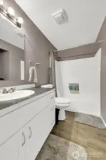 Nicely updated main bathroom.