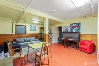 Common room with piano & bathroom