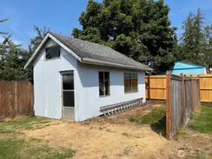 10 x 20 ft Storage Shed in North West Corner of Lot.