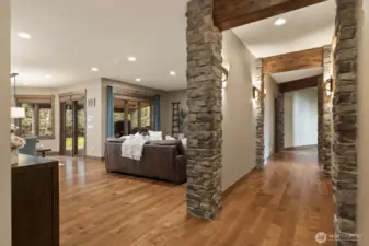 Stone wrapped walls and exposed beamed ceilings.