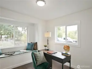 Sunlit workspace with dual windows and a peaceful vibe—your go-to spot for productivity or quiet reflection.