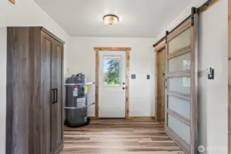 Side entry. Large mud room