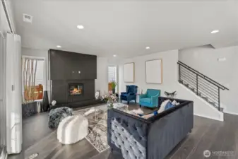 Cozy living room looking towards staircase