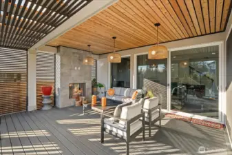 Patio fireplace and custom light fixtures set an elegant tone!