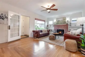 Living room with doorway to front foyer