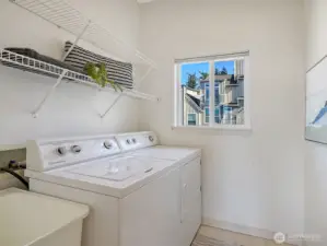The upstairs utility room is convenient- it also has a laundry tub.