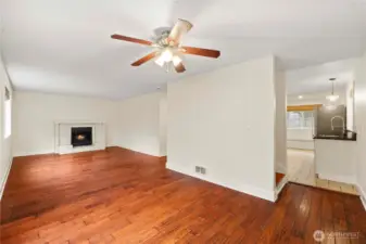 The gorgeous hardwood floors continue throughout the family room and dining room.