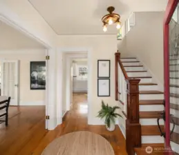 Rich with original character, this beautiful home showcases top-nail oak hardwood floors, crown moulding, and vintage light fixtures.