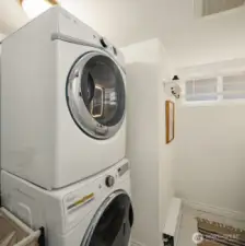 Laundry located in lower-level bathroom.
