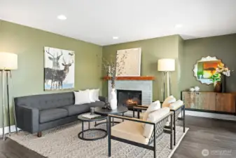 Plenty of room to add a TV in the corner.  Plus this space would accommodate an  L-shaped couch easily.