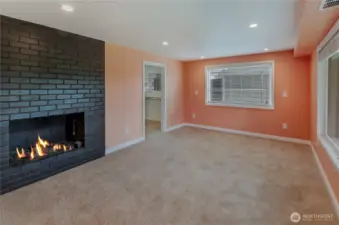 Primary suite with gas fireplace and 5 pc bath