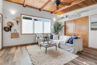 Wood pocket doors provide privacy for the primary bedroom with big closet.