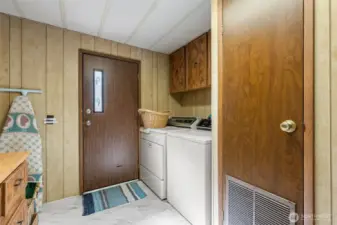 Laundry room door leading out to the back yard.