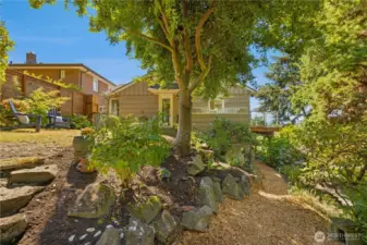 Looking back at the home from upper back yard