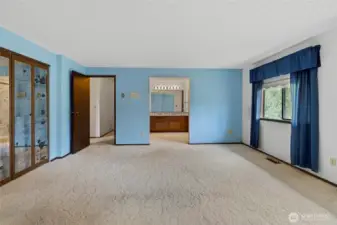 Additional view of primary bedroom facing the 3/4 primary bathroom