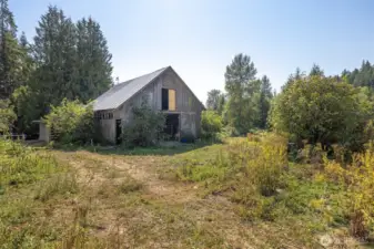 Barn has a metal roof and some interior updates.