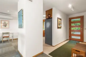 View of entryway and entrance to kitchen
