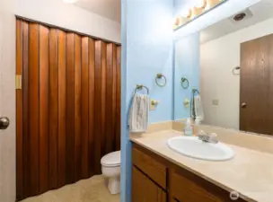 Half bath on main level with utility closet and washer/dryer