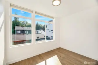 Bedroom 2 on second floor facing south.