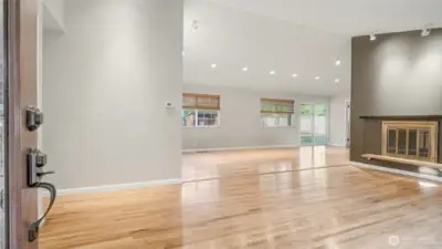 Enter into beautiful hardwood floors, vaulted ceilings and recessed lighting.