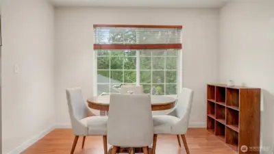 Dining area in the ADU gets plenty of light, would also work great as an office space.