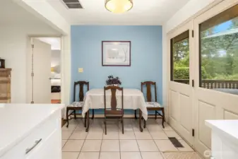 Dining space with French doors to the back yard oasis