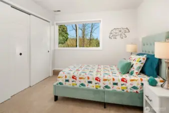 Bedroom #3 on the lower level has a full wall of closets.