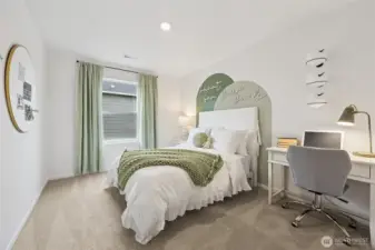 Additional bedroom up featuring a walk-in closet.   Pictures are for representational purposes only, colors and features may vary.