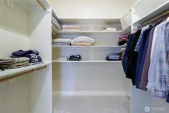 Primary bedroom walk-in closet