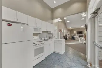 The kitchen has full-size appliances.