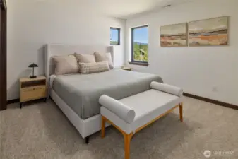 Second of two bedrooms on the upper level. There is also a shared bath. This photo is of the model home.