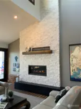 Propane Fireplace with stone to the ceiling