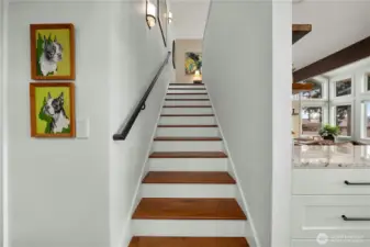 Beautiful stairway with custom handrail.