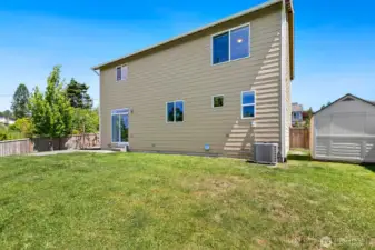 Great storage shed on side yard, stays with property.