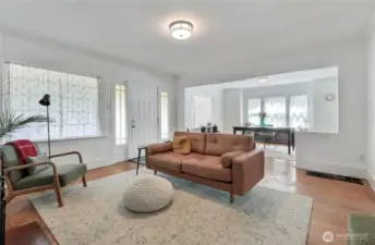 Living room is open to dining room and makes this space nice and airy.