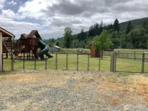 Large play toy stays along w/ merry go round