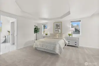 Primary bedroom with sitting room and ensuite bathroom