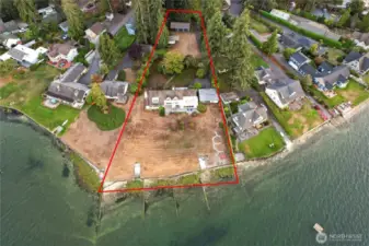 This double lot with 186' waterfront, and deeded tideland rights provides privacy and space for you, your family, and friends.  With plenty of parking and room to expand.  Your life has just become a vacation!