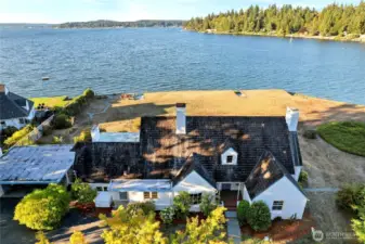 This historic home with its unique cedar butt-shake roof will give you decades more of peace and comfort.