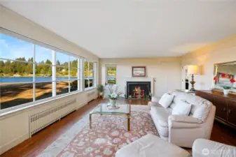 The panoramic views in almost every room will capture your attention. But look again at the beauty inside.  This home will amaze you!