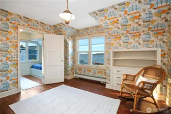 Bedroom 1, ADORABLE children's room. In this room are more custom built-ins, a walk-in closet, and a sleeping room with two built-in bunks.  Every bedroom has water views!