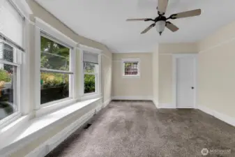 Enormouse dining room with built-in window seat.