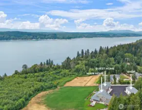 5 Acre estate w/ 3 distinct structures - main home, guest home & garage + additional shop.