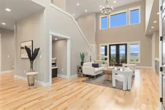 20 FT Soaring Vaulted Ceilings Throughout main level.